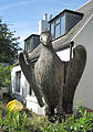 The wooden sculpture of a bird is a landmark of the vingtaine