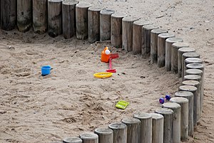 Detail of sandbox with toys