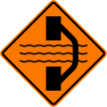 Bridge out ahead with a temporary bridge on a detour on right