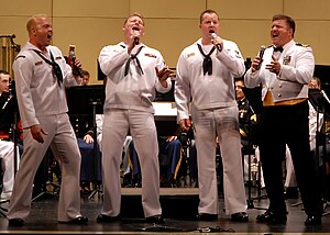 Barbershop quartets, such as this US Navy group, sing 4-part pieces, made up of a melody line (normally the lead) and 3 harmony parts. US Navy 080615-N-7656R-003 Navy Band Northwest's Barbershop Quartet win the hearts of the audience with a John Philip Sousa rendition of.jpg