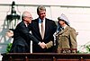 Israeli Prime Minister Yitzhak Rabin, U.S. President Bill Clinton, and Yasser Arafat at the Oslo Accords signing ceremony on 13 September 1993