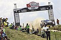 The Ford Fiesta WRC of Elfyn Evans and Daniel Barritt jumping at the Rally de Portugal's iconic Fafe stage.