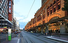 The facade as viewed from Flinders Street, showing tram lines in February 2010