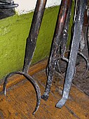 Ukhvats of varying sizes, fire iron, and chapelnik (to handle pans)