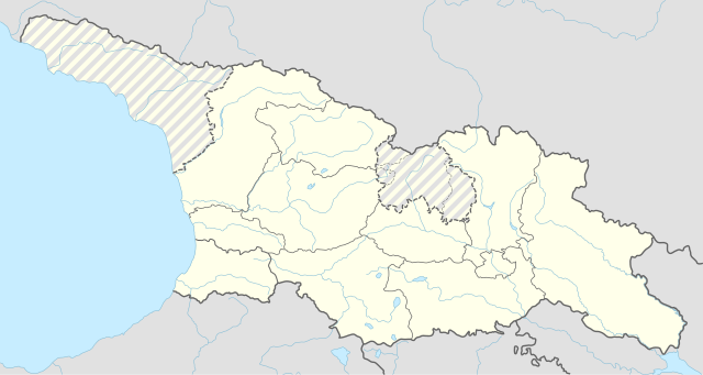 Mapa konturowa Gruzji, u góry po lewej znajduje się punkt z opisem „Gudauta”