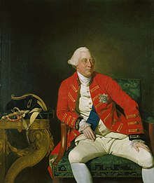 Three-quarter length seated portrait of a clean-shaven George with a fleshy face and white eyebrows wearing a powdered wig.