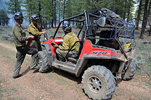 Polaris RZR ATV used by firefighters in the Kaibab National Forest McRae Fire. Firefighters discussing strategy. Polaris Ranger ATV.jpg