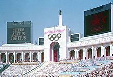 Opening ceremony of the 1984 Summer Olympics at the LA Coliseum Olympic Torch Tower of the Los Angeles Coliseum.jpg