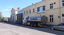 A tank truck for a milk delivery parked in front of the Satamaito dairy in Pori, Finland Satamaito Dairy (001).jpg