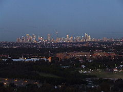 The Sydney central business district from the city's western suburbs Sydney Skyline (5620756401).jpg