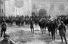 Italian troops in Trento on 3 November 1918, after the Battle of Vittorio Veneto. Italy's victory marked the end of the war on the Italian Front and secured the dissolution of Austria-Hungary. Trento 3 novembre 1918.jpg