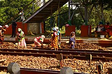 Poor women working on a railway track Working women 04.jpg