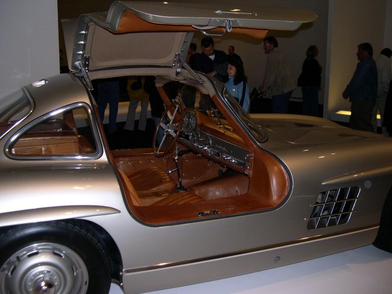 Looks like the car was somewhat inspired by the Mercedes Gullwing 300SL
