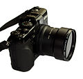 Nikon Coolpix P7100 équipé d'un filtre polarisant