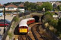 A pair of Island Line Class 483s in London Underground livery entering the Ryde tunnel.