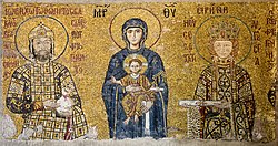 A mosaic depicting a haloed woman holding a baby, flanked by a man and woman, both crowned and haloed