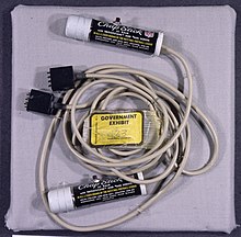 During the break-in, E. Howard Hunt and G. Gordon Liddy remained in contact with each other and with the burglars by radio; these Chapstick tubes outfitted with tiny microphones were later discovered in Hunt's White House office safe. Government Exhibit 133, Chapstick Tubes with Hidden Microphones - NARA - 304967.jpg