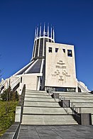 A modernist cathedral shaped like a funnel.