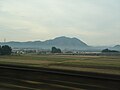 東北新幹線線より望む羽黒山（2006年12月撮影）