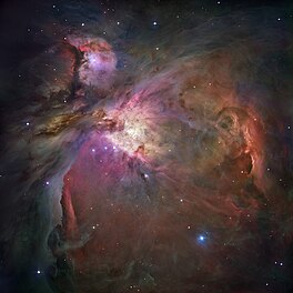 Die hele Orion-newel in sigbare en infrarooilig. Bron: Nasa/ESA