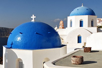 Blue domes of the Church dedicated to St. Spirou in Firostefani, Santorini island (Thira), Greece.