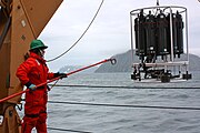 A teacher retrieves a CTD-rosette from the waters of the Bering Strait on the ICESCAPE mission in June 2011.