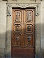 Різьблені двері з зображенням святих ордену валомброзіан