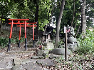 Takuzōsu Inarin pyhäkkö Koishikawan kaupunginosassa