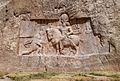 A rock-face relief at Naqsh-e Rostam, depicting the triumph of Shapur I over the Roman Emperor Valerian.