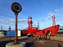 ☎∈ Tidal-powered lunar clock Alunatime and lightship LV93 at Trinity Buoy Wharf, London in September 2012.