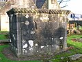 The Crawfurd's tomb with the old Kirk in the background.