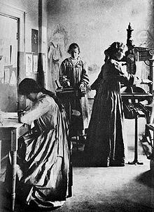The Dun Emer Press in 1903 with Elizabeth Yeats working the hand press Dun Emer Press ,c. 1903.jpg