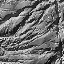 A close-up view of Enceladus's ridges Enceladus - November 21 2009 (37416820511).jpg