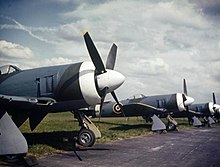 New Tempest IIs of the first production batch at Hawker Aircraft. Note the closely cowled engine and the carburettor and oil-cooler intakes in the starboard wing's inner leading edge. Hawker Tempest II at Hawker plant c1945.jpg