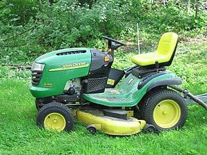 English: A John Deere L120 lawn mower in a Fin...