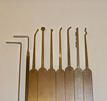 A traditional pick set. From left to right: torsion wrench, "twist-flex" torsion wrench, offset diamond pick, ball pick, half-diamond pick, short hook, medium hook, saw (or "L") rake, snake (or "C") rake. Lockpicks.jpg