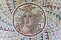 Римская мозаика из Пирея, изображающая Медузу, которая использует opus tessellatum, II век н. э., Национальный археологический музей Афин