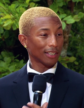 Two-time winner Pharrell Williams. Pharrell Williams at The Lion King European Premiere 2019.png