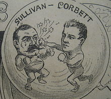 Two Irish stars: "Gentleman Jim" Corbett licks John L. Sullivan in 1892 SullivanCorbettBubbleMascot.JPG