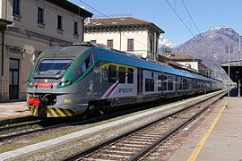 Due ETR.425 accoppiati in livrea Trenord in sosta alla stazione di Domodossola.