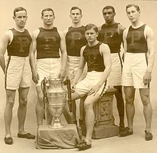 The University of Pennsylvania men's track team was the 1907 IC4A point winner. Left to right: Guy Haskins, R.C. Folwell, T.R. Moffitt, John Baxter Taylor, Jr., the first black athlete in the U.S. to win a gold medal in the Olympics, Nathaniel Cartmell, and J.D. Whitham (seated) Track (men's), 1907 ICAA point winners UPenn.jpg