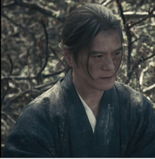 Image of Takashi Yamaguchi portraying Ryuichi in the Apple TV+ original drama series Pachinko.