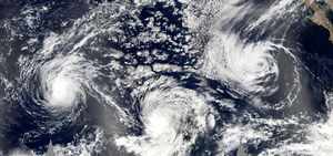 This unusual mosiac of storms shows, from left to right, Hurricane Jova, Hurricane Kenneth, and Tropical Storm Max.  Also shown on the far right is an intensifying tropical disturbance which later developed into Tropical Storm Norma.