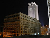 Woodmen Tower rises just west of the J. L. Brandeis and Sons Store Building.