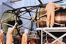 The OTA, metering truss, and secondary baffle are visible in this image of Hubble during early construction. Early stages of Hubble construction.jpg