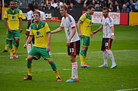 Burn playing for Fulham in a match against Norwich City, 2014 Fulham v Norwich (2014) (15576074245).jpg