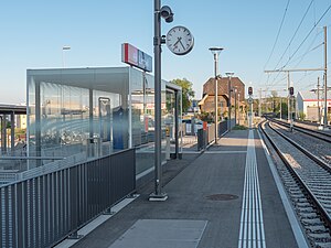 Enclosed waiting area on platform