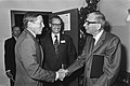 Prince Claus of the Netherlands greets Jo Thijsse at the opening of a colloquium at the Waterloopkundig Laboratorium, Delft, 1977.