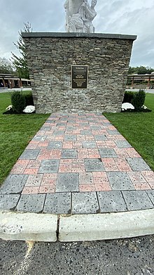 The commemorative bricks and the bronze plaque honor the people and organizations that contributed to the Horse Tamer restoration efforts.