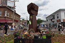 Fist sculpture and mementos, June 19, 2020 Remembering George Floyd at Chicago and 38th (50024293836).jpg